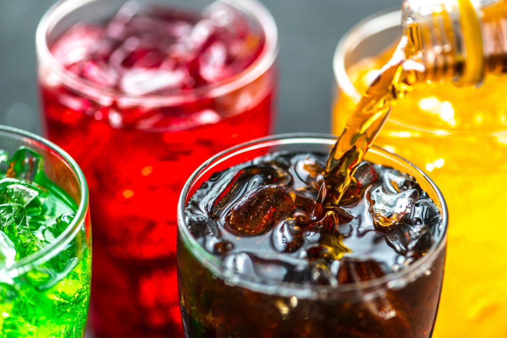 Poring Soda into Glass